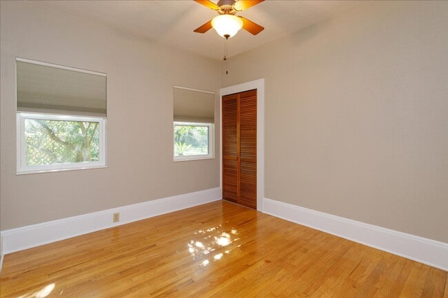 Building Photo - Run don't walk for this one of a kind beautifully maintained Old Florida Charmer on a park like d...