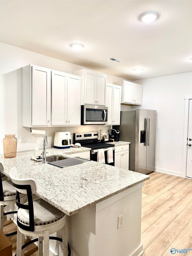 Building Photo - 7559 Discovery Pt Dr NW