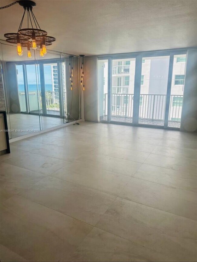 Building Photo - 5838 Collins Ave