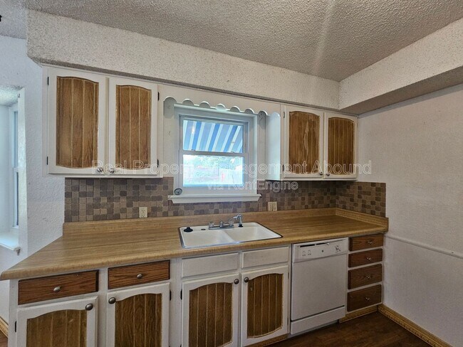 Building Photo - 7710 N 120th Ave E