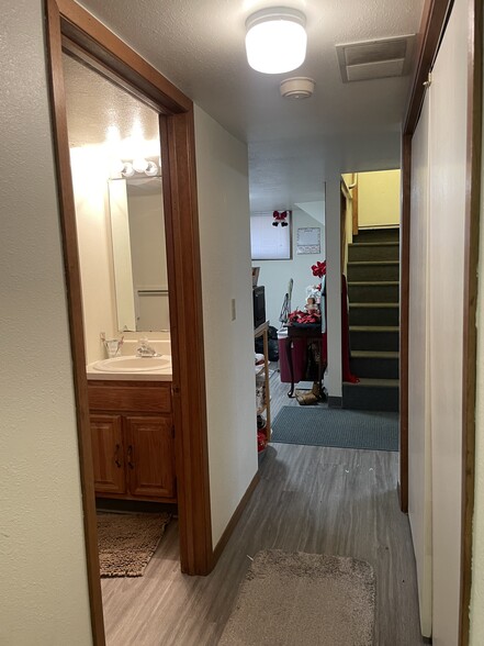 Hall view to kitchen and stairway to main entrance - 305 Terry Ave