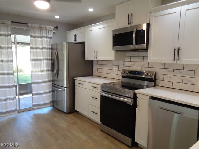 Building Photo - 6429 Royal Woods Dr
