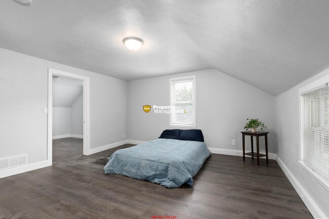 Building Photo - 4 bedroom home with 3 single car garges
