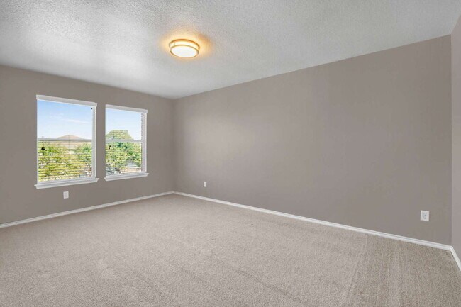 Building Photo - "Spacious 4-Bedroom Sanctuary with 3 Full ...