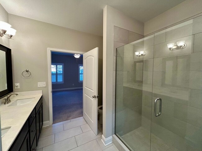 Building Photo - Spacious 3 bed, 3 bath home in Groves Park Commons featuring a modern kitchen, 2-car garage, and ...