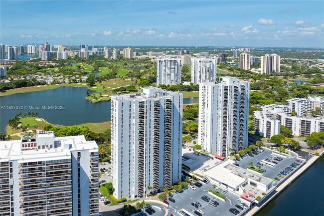 Building Photo - 3675 N Country Club Dr