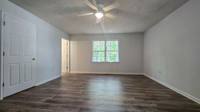 Building Photo - 5607 Whispering Pines Dr