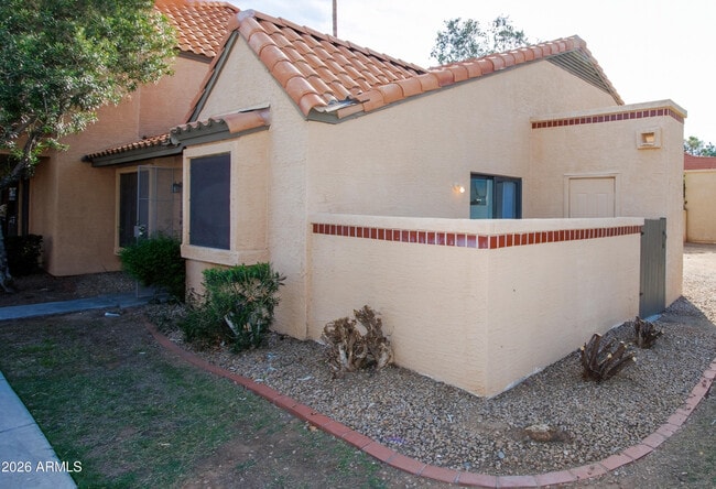 Building Photo - 5704 E Aire Libre Ave