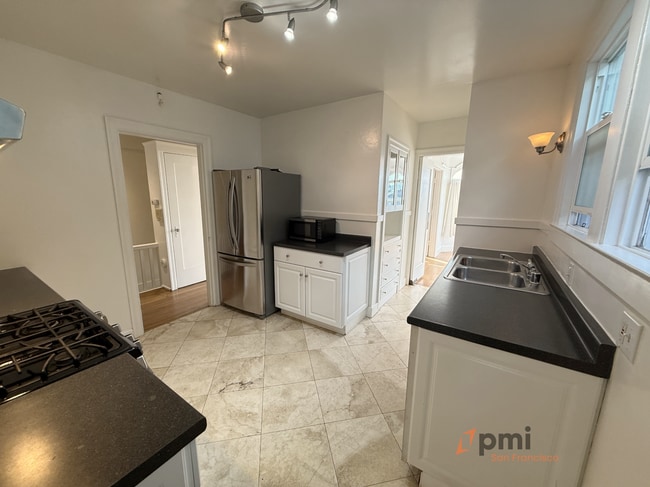 Building Photo - 2 Bd / 1 Ba Hillside Castle with Parking, Yard & Scenic Views