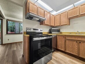 Building Photo - AVAILABLE NOW! Thoughtfully Updated Kingsgate Home with Fireplace and Fenced Yard