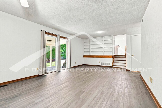 Building Photo - Spacious Home with Central AC and Traditional Wood Features