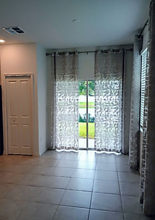 Building Photo - Townhouse in Land O' Lakes - The Townes at Lake Thomas