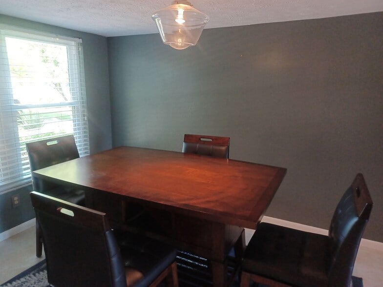 Building Photo - UPGRADED WATERFRONT END UNIT 3 BR / 2 BA Home With BOAT LIFT/ DOCK & OUTSTANDING VIEWS
