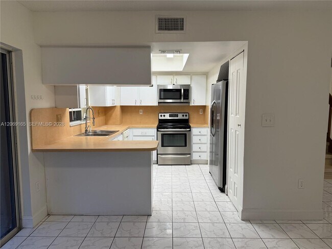 Building Photo - 12372 SW 52nd Ct