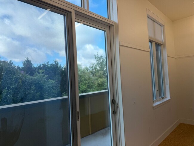 Building Photo - Bright Live-Work Studio with Deck & Tall Ceilings off Lowell Street in Oakland