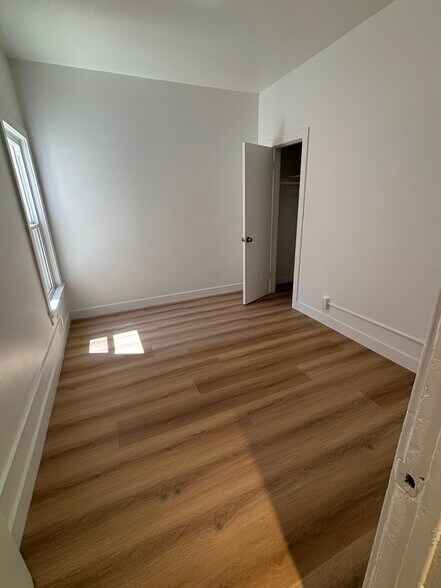 Bedroom with closet - 2109 1/2 W 54th St