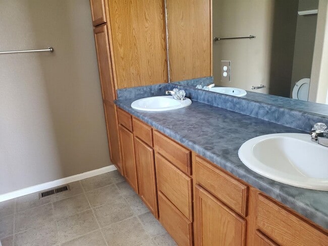 Building Photo - Tri-Level with Primary at top and 2 bedrooms on the lower level.