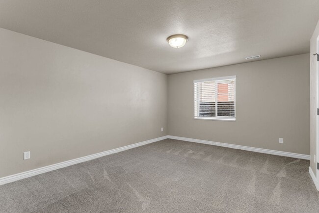 Building Photo - Spacious Syracuse Home with Covered Deck, Loft & Oversized 3-Car Garage