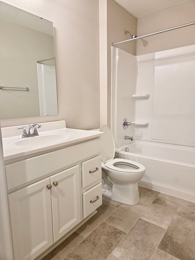 Building Photo - Exquisite just built condo with everything! Ground floor, no stairs, attached garage