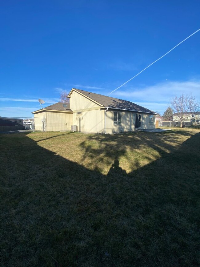 Building Photo - House with Triple Car Garage