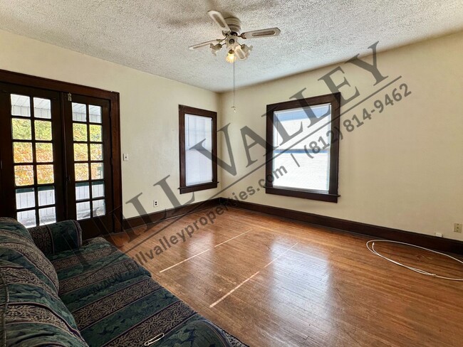 Building Photo - Two Bedroom Upper - All Utilities Paid