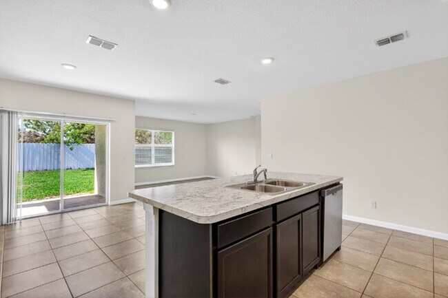 Building Photo - Renovated 4 Beds 2 Baths Single Family on Over a QTR Acre lot | Huge Yard