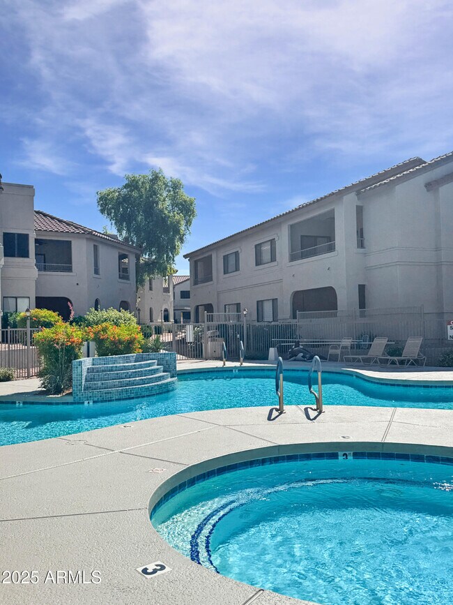 Building Photo - 9455 E Raintree Dr