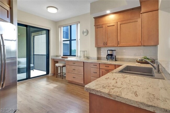 Building Photo - 7008 Pelican Bay Blvd