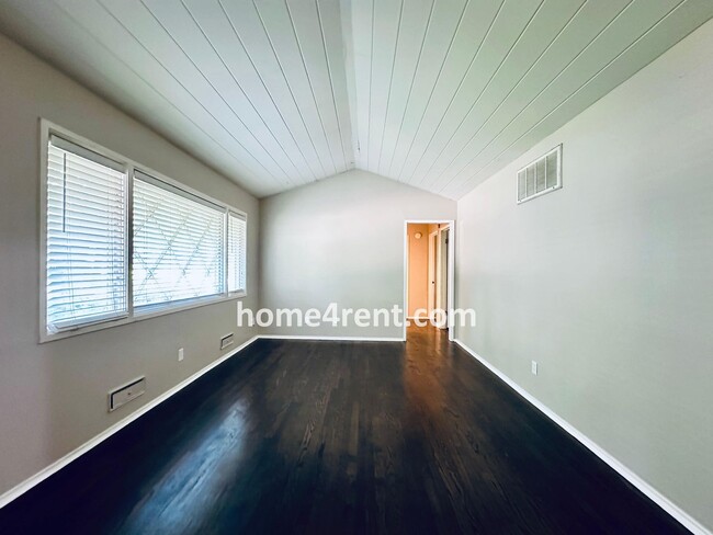 Building Photo - Attractive Prairie Village Ranch w/ FRESH PAINT, Wood Floors, Granite Counters and a Fenced Yard!