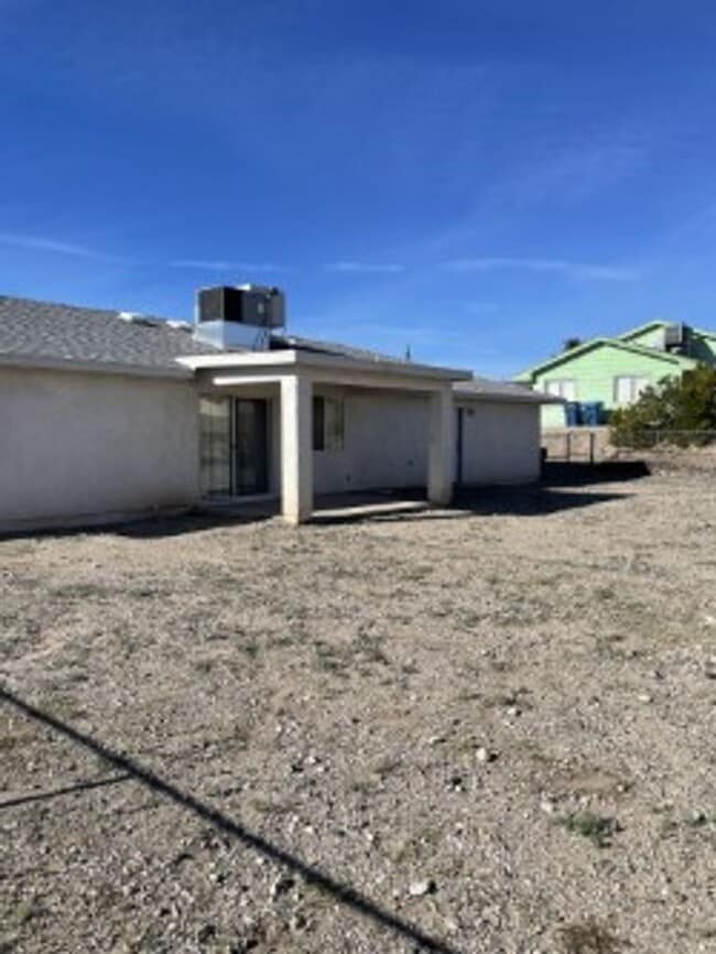 Building Photo - North side home, pet friendly with fenced back yard.