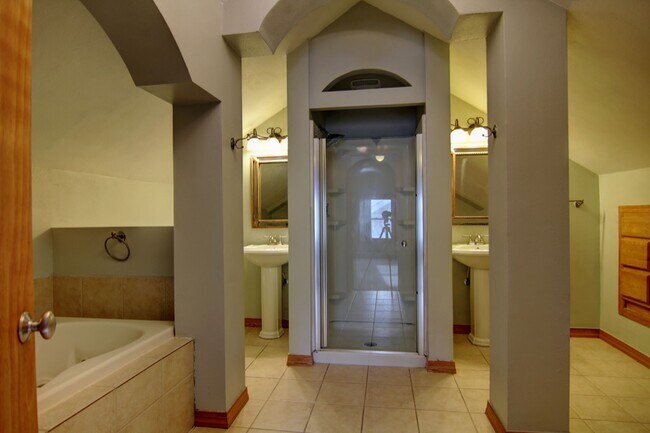 Double vanity's surround the shower - 5427 Xerxes Ave S