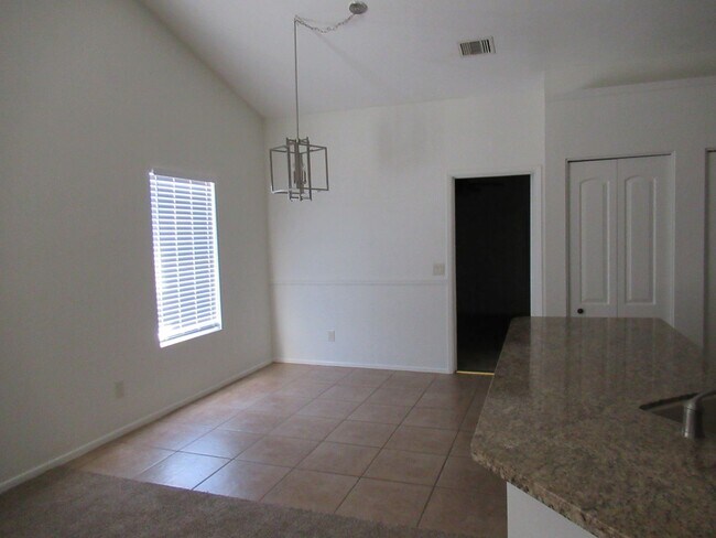 Building Photo - Nice 4 Bedroom + Den Home With Pool In AHW...