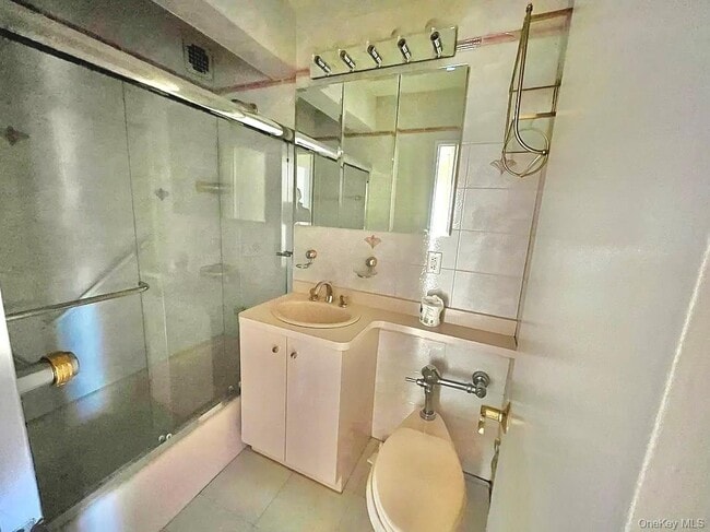 Building Photo - 100-25 Queens Blvd