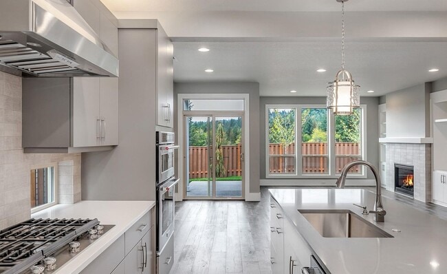 Building Photo - Bethany Stunner - 5 Bedrooms with Main-Level Bed & Bath, Modern Kitchen & Private Fenced Yard