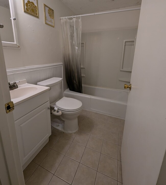 Bathroom with tub and shower - 131 Creek St