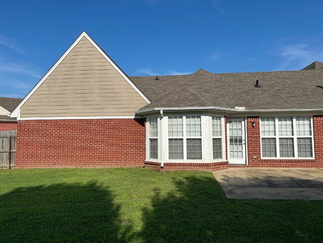 Building Photo - Spacious 4BR/2BA Olive Branch Home | 1,965 Sq Ft, Modern Fireplace, Bay Window & 2-Car Garage