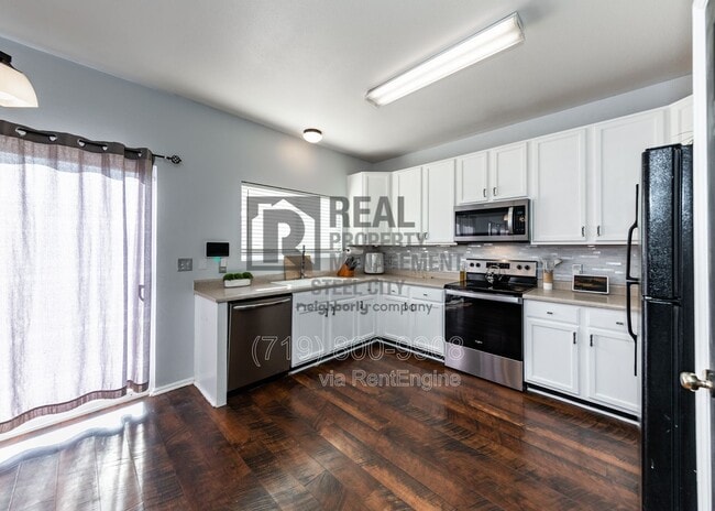 Building Photo - 2214 Cowhand Pl