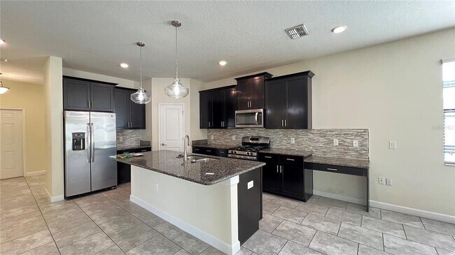 Building Photo - 7755 Purple Finch St