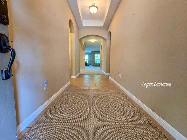 The welcoming entrance sets the tone for the rest of the home, offering both warmth and comfort. - 301 Silver Trl