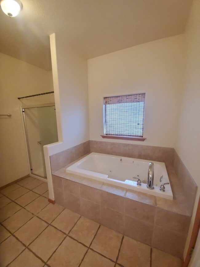 Building Photo - Triple Car Garage & New Interior Paint