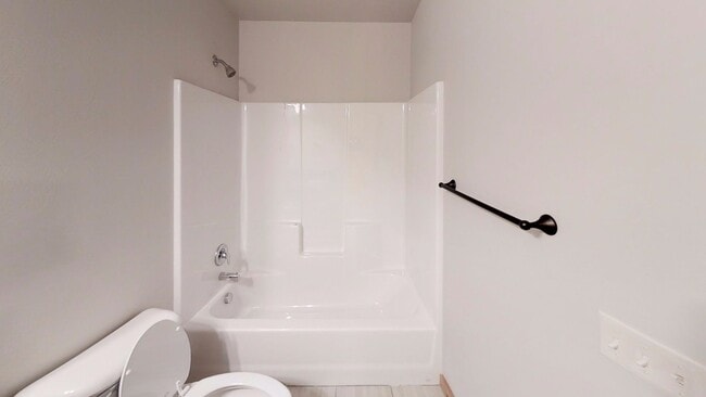 Building Photo - Spacious Townhome with Central Heat/Air - Two Car Garage, Fenced in Backyard! **EARLY BIRD PRICIN...