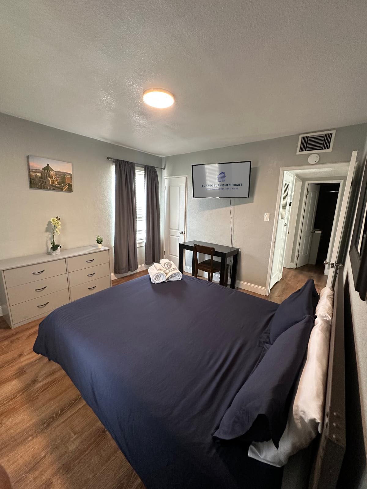 Bedroom with Smart TV - 3831 Monroe Ave