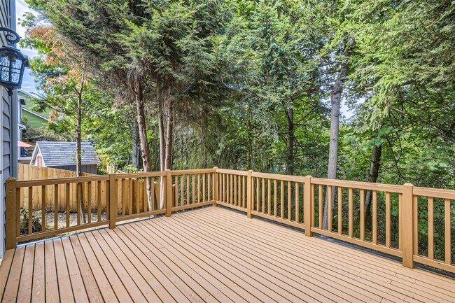 Building Photo - Spacious 4-Bedroom Home in Kenmore | Private Greenbelt Setting + Landscaping Included