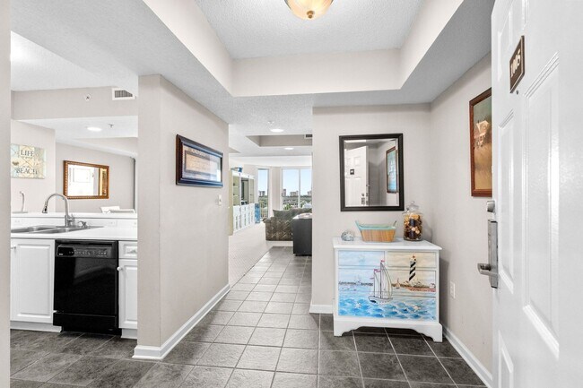 Building Photo - Spacious 3BR/3BA Coastal Retreat at Harbour Pointe – Utilities Included!