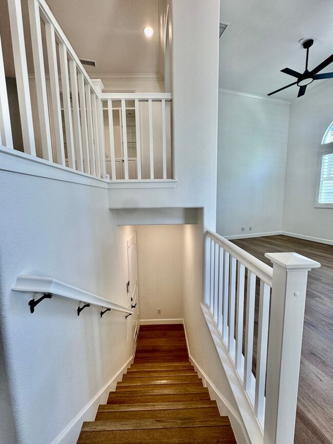 Building Photo - Beautifully Remodel Townhouse with AC & Two Car Garage!