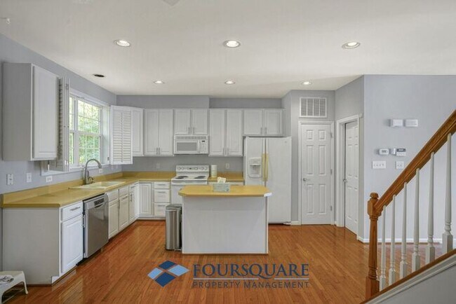Building Photo - Lakefront Townhome with 1st Floor Bedroom, Fireplace & 2-Car Garage – In Raleigh