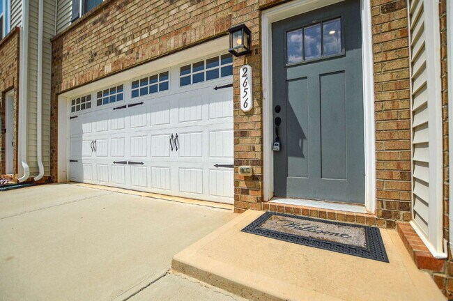 Building Photo - 3 Bedrooms | 2.5 Bathrooms | Lower-Level Flex Room | Approximately 1,978 Square Feet | 2-Car Gara...