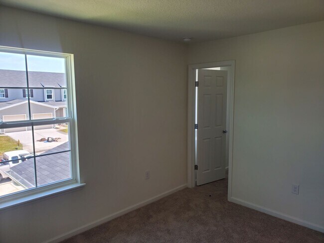 Building Photo - 3 Bed 2.5 Bath with Garage in the newly de...