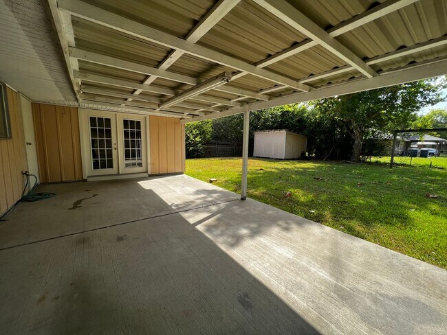 Building Photo - 3 Bedroom, 1.5 Bathroom, Brick Home with yard and Storage Building