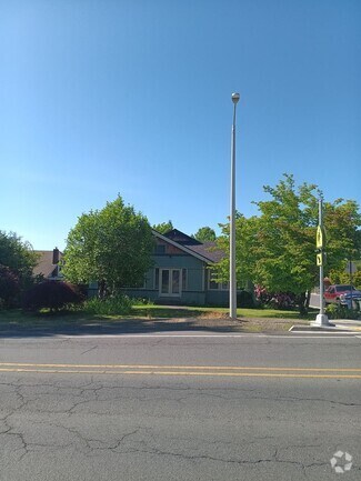 Building Photo - Available July 1st:  Young Professional Mo...